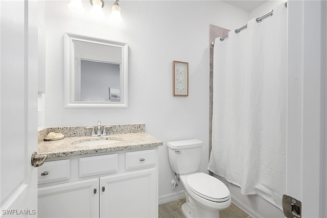 full bathroom featuring toilet, shower / tub combo, and vanity