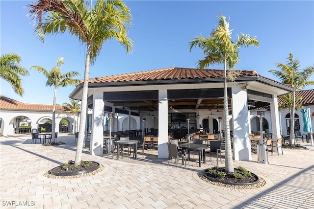 view of patio / terrace featuring ceiling fan