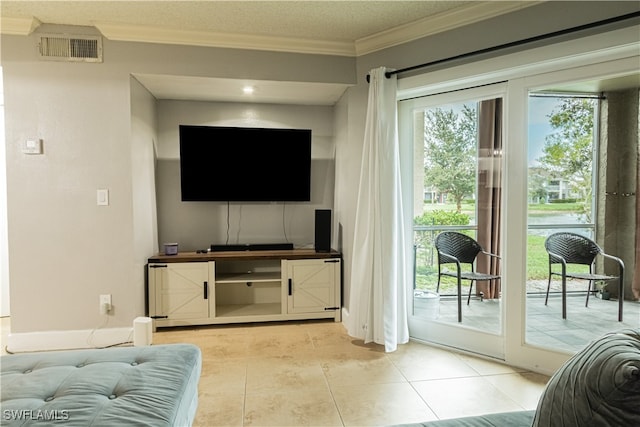 tiled living room featuring a healthy amount of sunlight, crown molding, and a textured ceiling