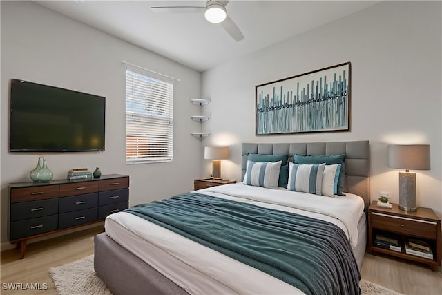 bedroom featuring ceiling fan and light wood-type flooring