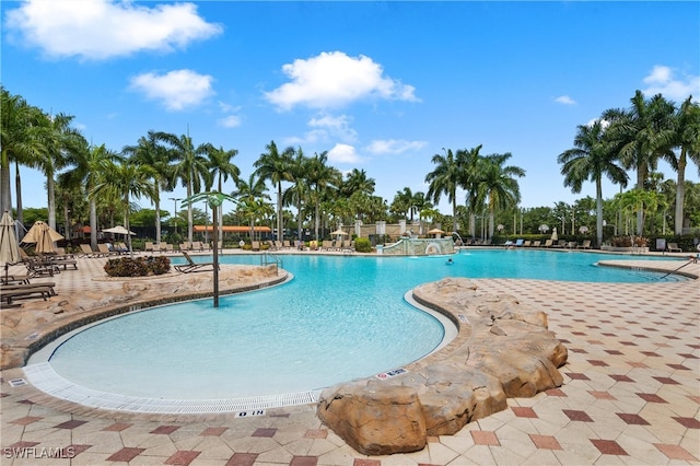 view of swimming pool featuring a patio area