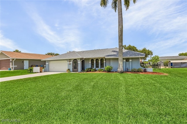 single story home featuring a garage and a front lawn