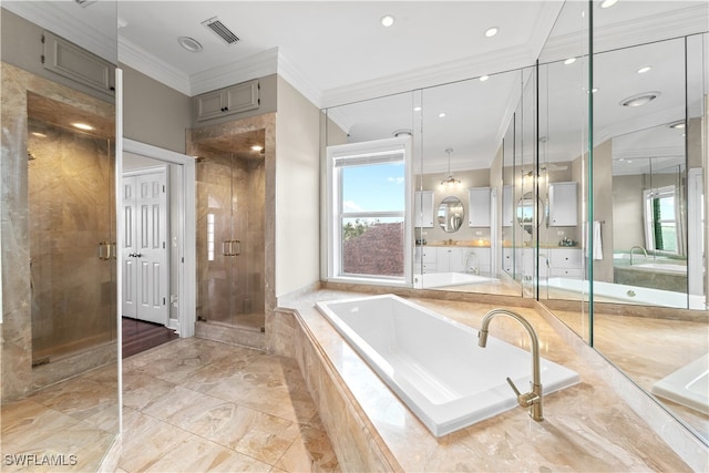 bathroom featuring vanity, shower with separate bathtub, and ornamental molding