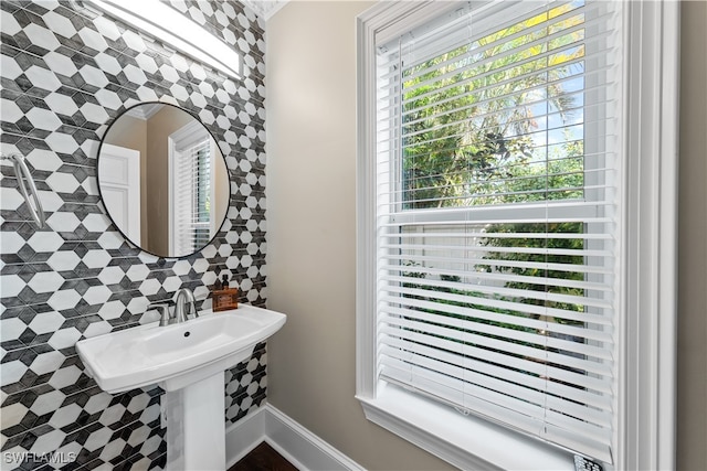 bathroom with tile walls