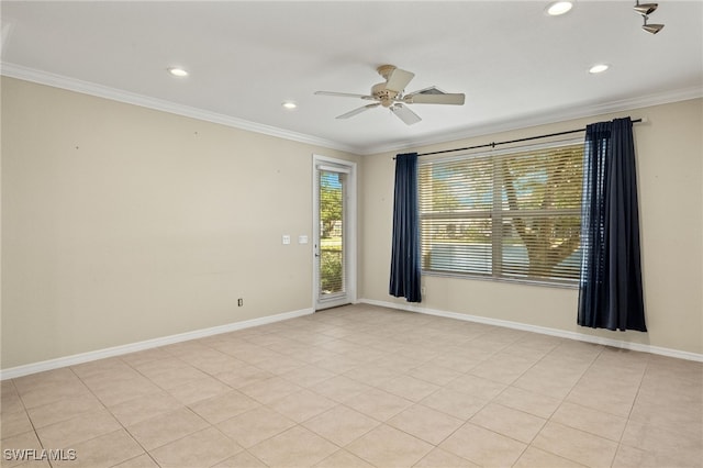 empty room with ceiling fan, light tile patterned floors, and ornamental molding