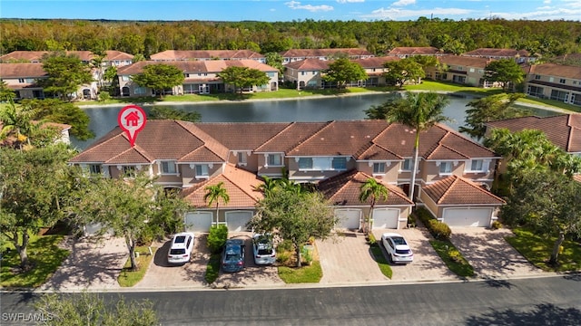 bird's eye view with a water view