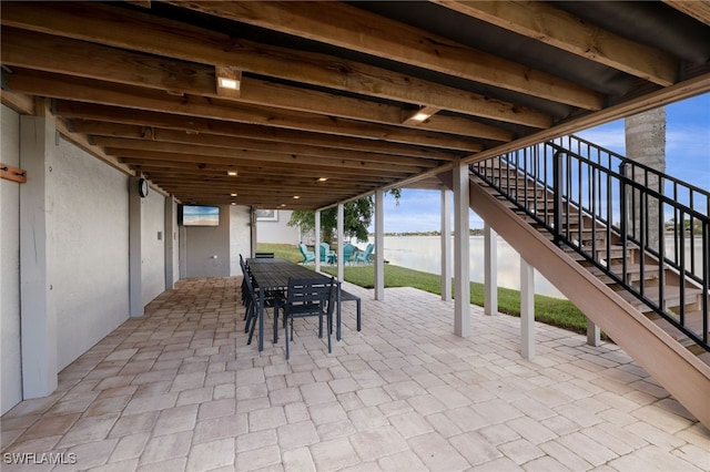 view of patio / terrace featuring a water view