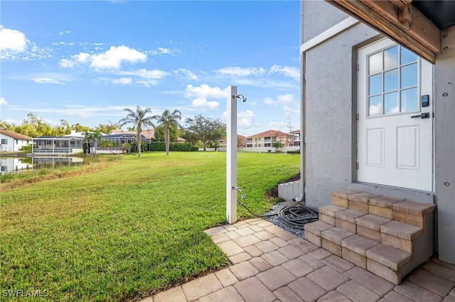 view of yard with a water view