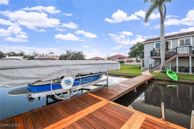 dock area featuring a water view