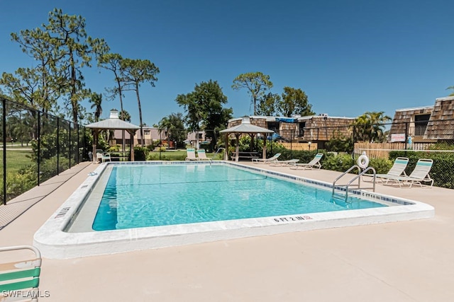 view of swimming pool with a gazebo