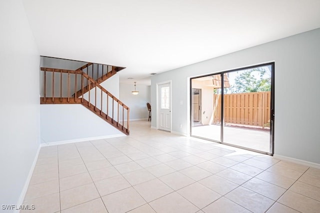 empty room featuring light tile patterned floors