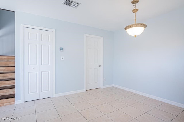 view of tiled spare room