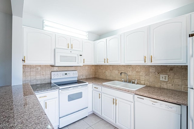 kitchen with white cabinets, white appliances, and sink