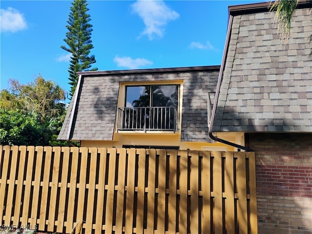 view of property exterior featuring a balcony