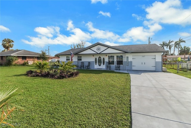 single story home featuring a garage and a front lawn