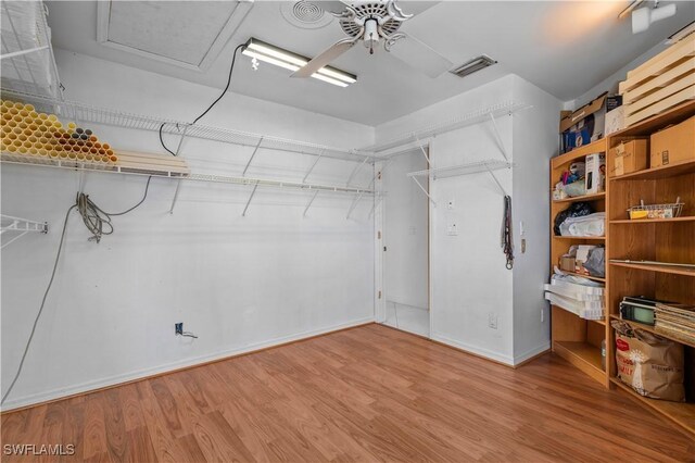 837 SW 2nd Ave, Cape Coral, FL 33991 - spacious closet featuring wood finished floors and ceiling fan