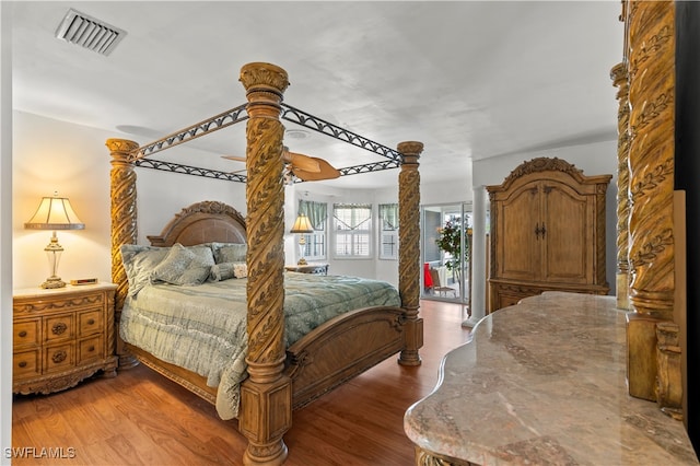 bedroom featuring hardwood / wood-style flooring