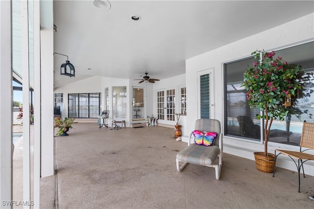 view of patio featuring french doors and ceiling fan