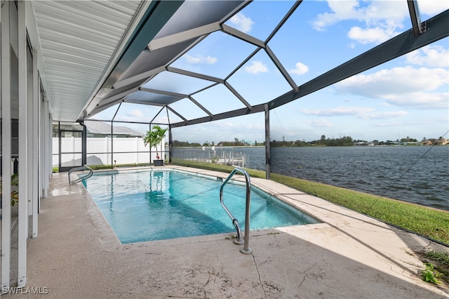 view of swimming pool featuring a patio area, a water view, and a lanai