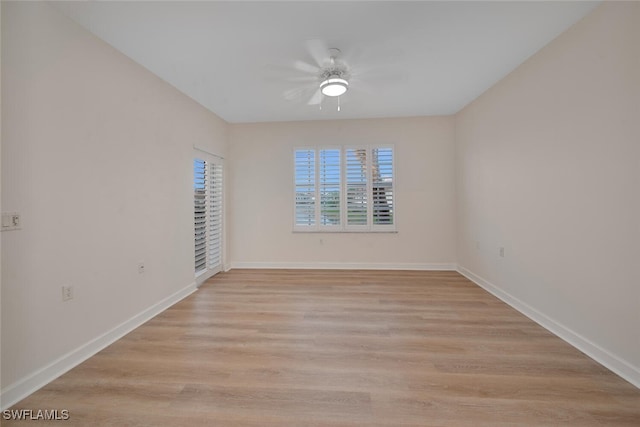 empty room featuring light hardwood / wood-style floors and ceiling fan