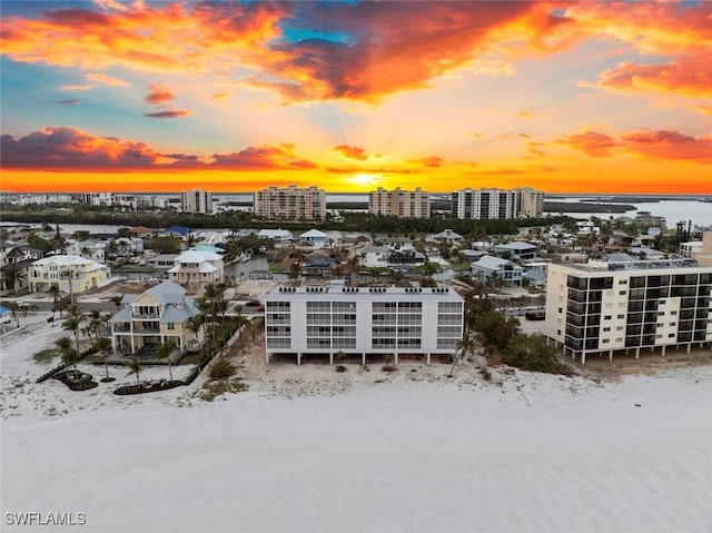 birds eye view of property featuring a city view