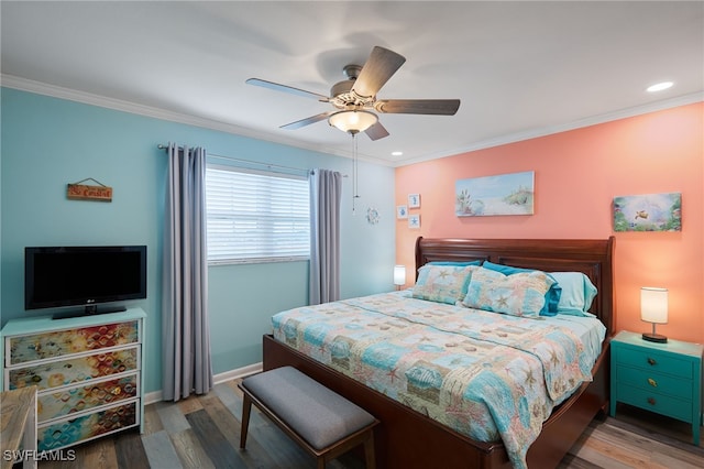 bedroom with ceiling fan, ornamental molding, and hardwood / wood-style flooring