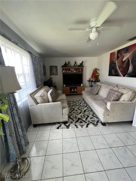 living room featuring ceiling fan