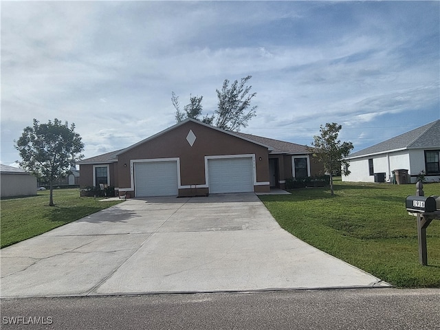 ranch-style home with a garage and a front yard