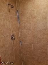 room details featuring tiled shower