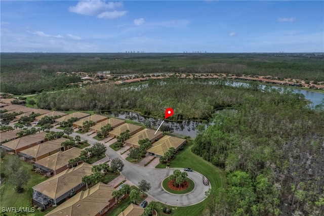 birds eye view of property with a residential view and a water view