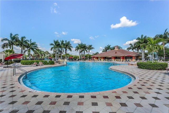 view of swimming pool featuring a patio