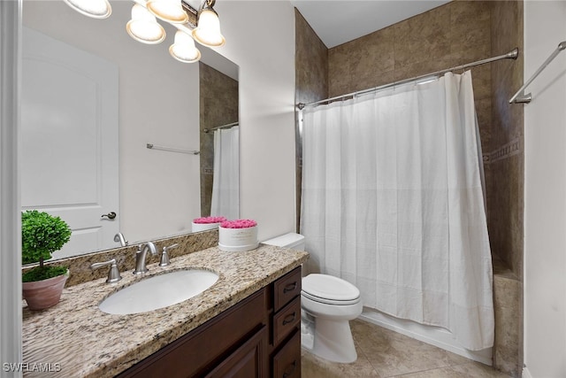 full bathroom featuring vanity, shower / tub combo with curtain, tile patterned floors, and toilet