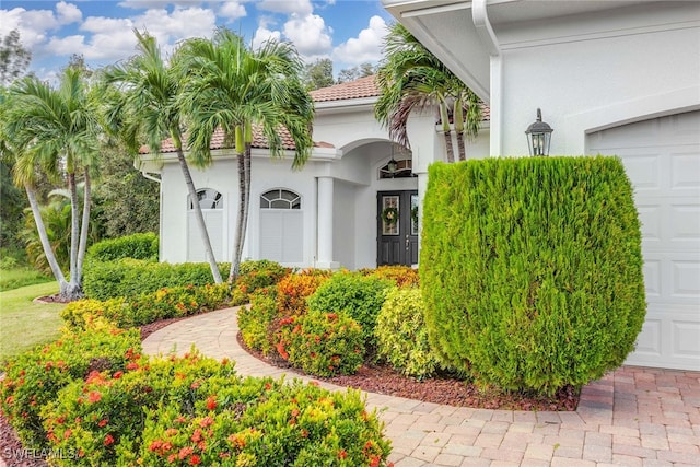 exterior space with a garage