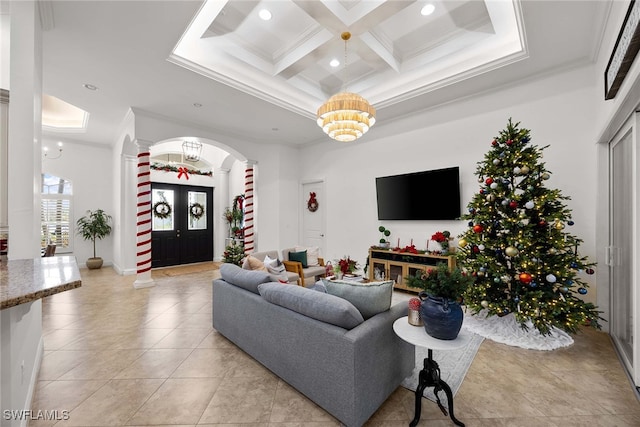 tiled living room featuring french doors, ornamental molding, coffered ceiling, a high ceiling, and beamed ceiling