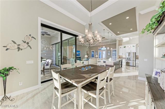 dining area with ornamental molding and ceiling fan with notable chandelier