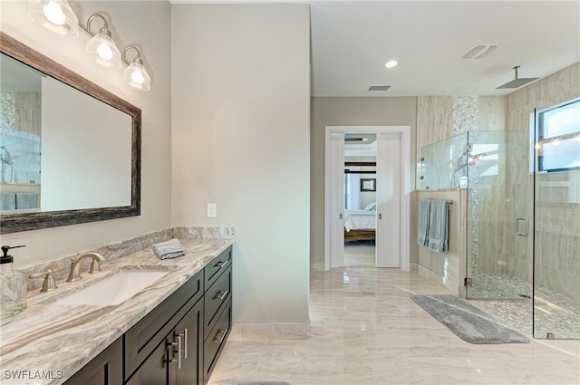 bathroom featuring walk in shower and vanity