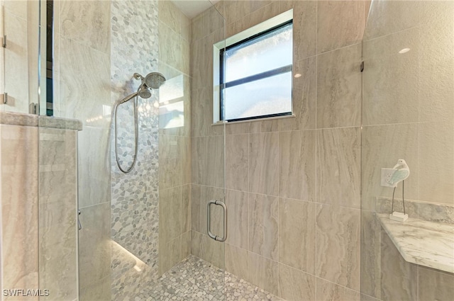 bathroom with walk in shower