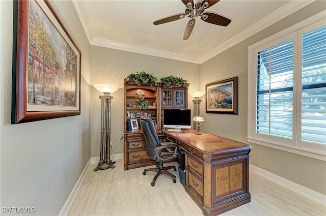 office area with ceiling fan and crown molding