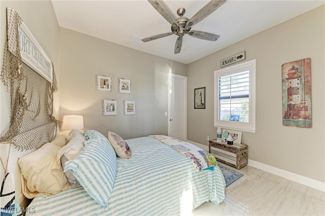 bedroom featuring ceiling fan