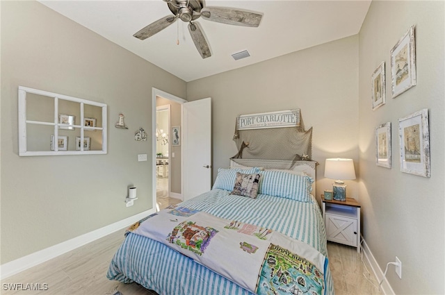 bedroom with light wood-type flooring and ceiling fan