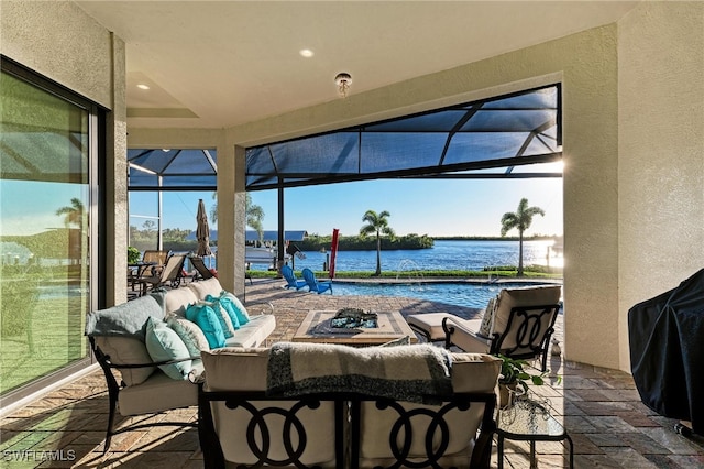 view of patio / terrace featuring a water view and an outdoor hangout area