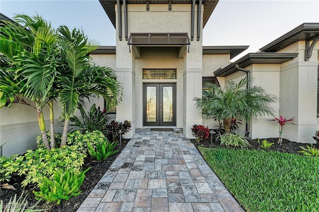 doorway to property featuring french doors