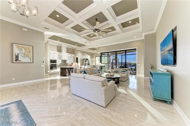 living room featuring coffered ceiling, ceiling fan with notable chandelier, ornamental molding, and beam ceiling