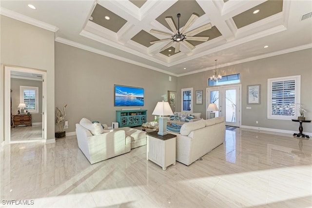 living room featuring a wealth of natural light, crown molding, and coffered ceiling