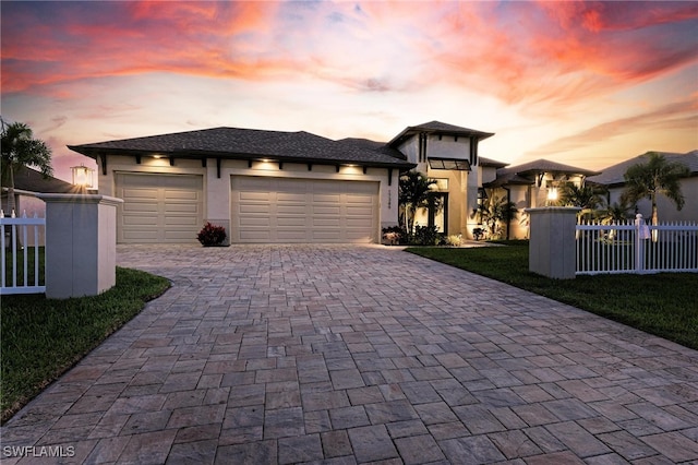 prairie-style home featuring a garage