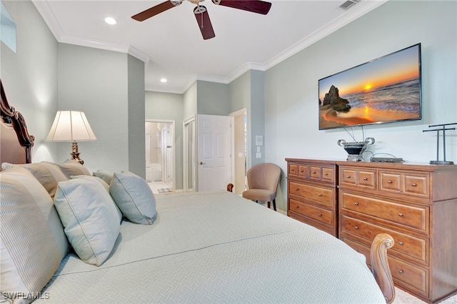 bedroom featuring ceiling fan, ornamental molding, and ensuite bath