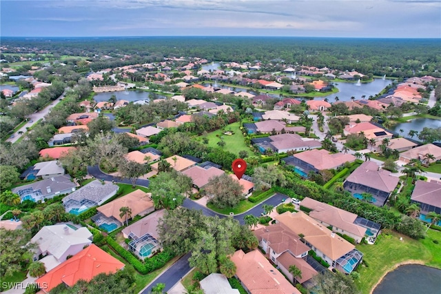 drone / aerial view with a water view