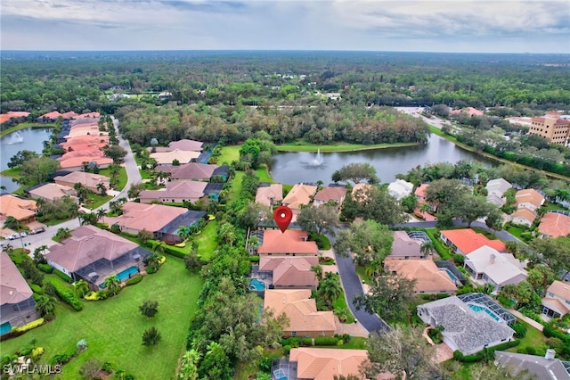 drone / aerial view with a water view