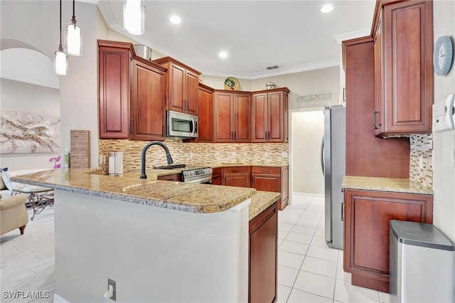 kitchen featuring hanging light fixtures, stainless steel appliances, kitchen peninsula, crown molding, and decorative backsplash