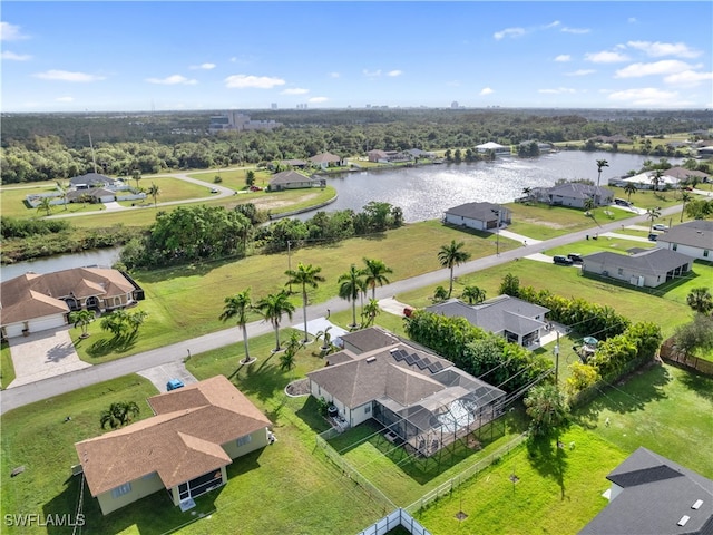 bird's eye view with a water view